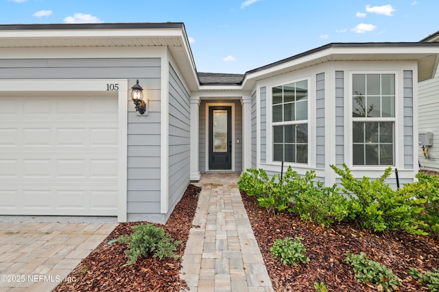 property entrance featuring a garage