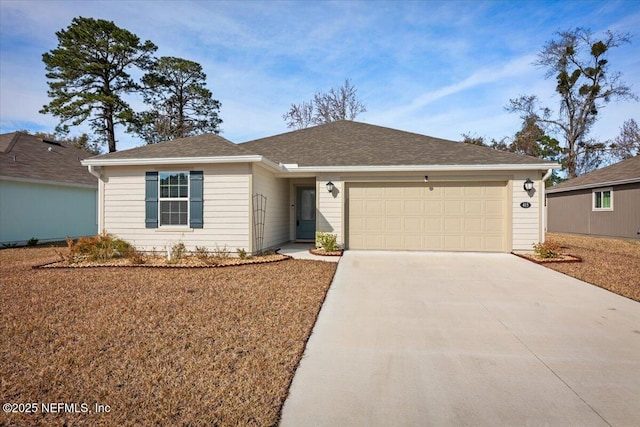 ranch-style home with a garage