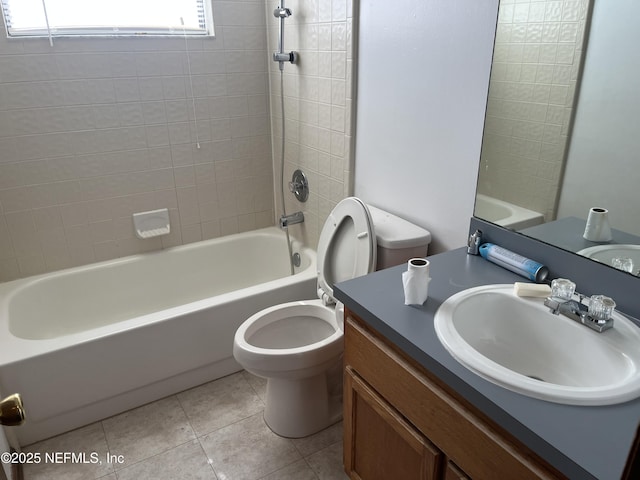 bathroom with vanity, tile patterned floors, bathing tub / shower combination, and toilet