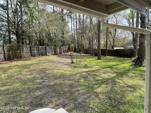 view of yard featuring a fenced backyard