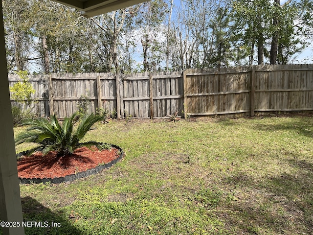 view of yard with fence