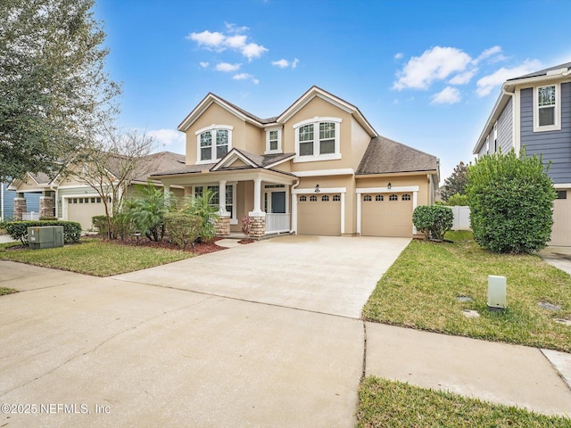 view of front of home with a porch and a front lawn