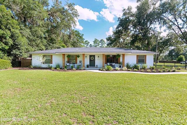 single story home with a front lawn and a porch