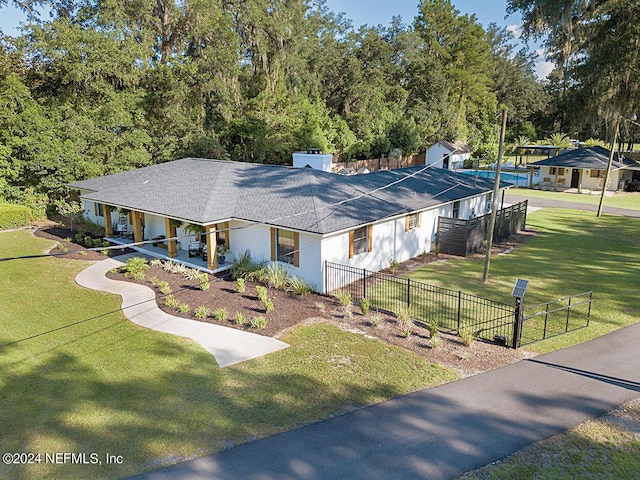 view of front of home with a front yard