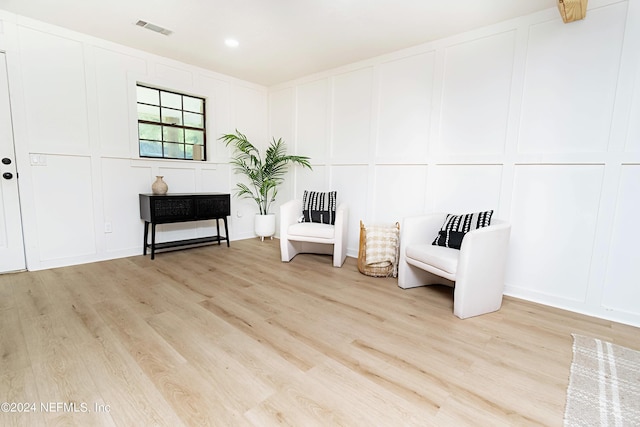 living area featuring light hardwood / wood-style flooring