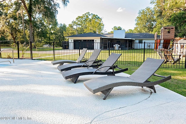 view of patio featuring a playground