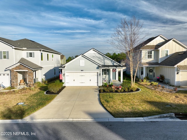 view of front of property with a garage and a front lawn