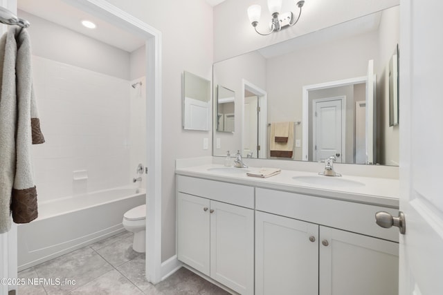 full bathroom featuring tile patterned flooring, vanity, shower / bathtub combination, and toilet