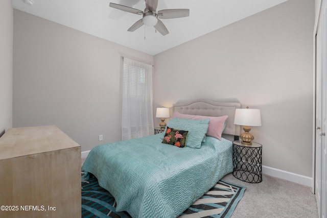 carpeted bedroom featuring ceiling fan