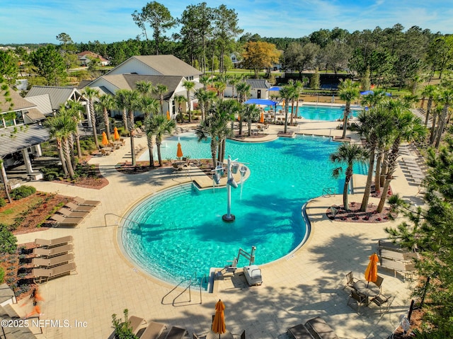 view of swimming pool featuring a patio