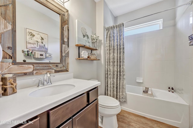 full bathroom with vanity, toilet, shower / tub combo, and hardwood / wood-style floors