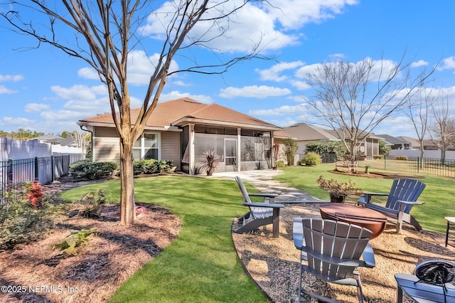 view of yard featuring a sunroom