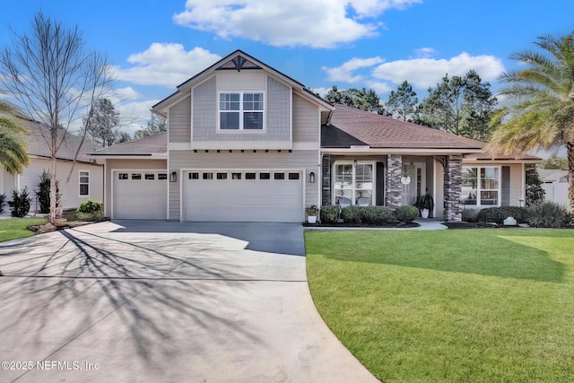 front of property with a garage and a front yard