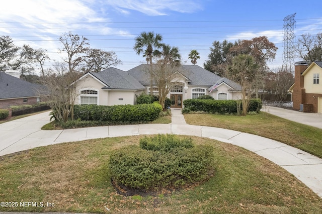 view of front of house with a front lawn