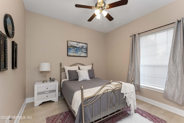 bedroom featuring ceiling fan