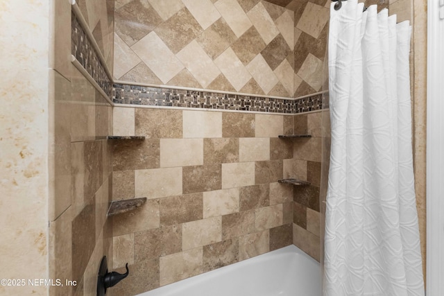 bathroom with shower / bath combo