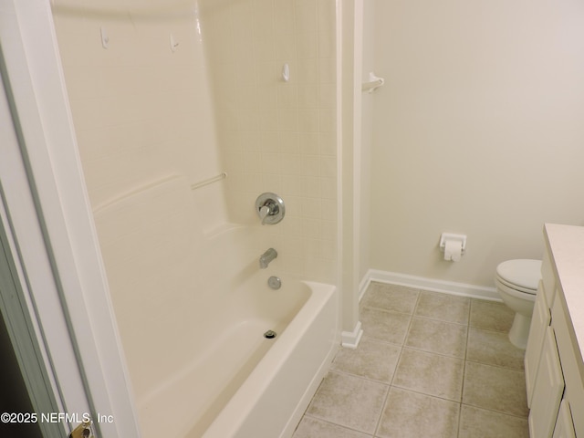 full bathroom with toilet, vanity, tile patterned floors, and shower / tub combination