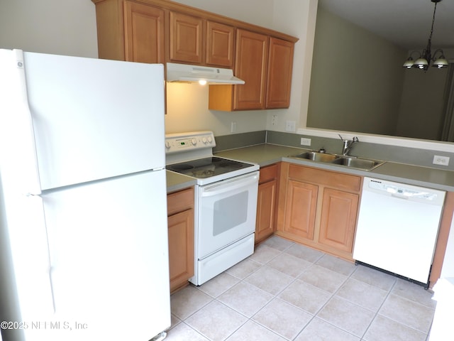 kitchen with pendant lighting, white appliances, an inviting chandelier, sink, and light tile patterned floors