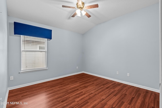 spare room featuring hardwood / wood-style flooring, ceiling fan, lofted ceiling, and a textured ceiling