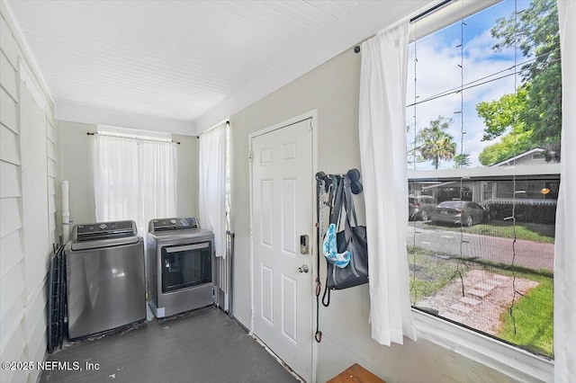 laundry area with separate washer and dryer