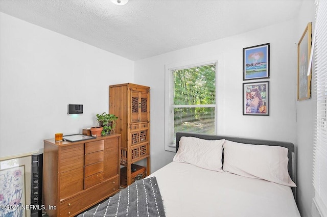 bedroom with a textured ceiling