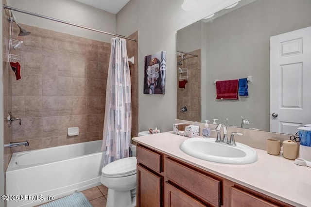 full bathroom featuring vanity, toilet, tile patterned floors, and shower / tub combo with curtain