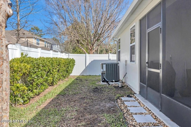 view of yard featuring central AC unit