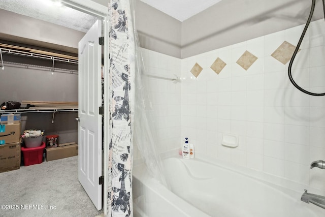 bathroom featuring shower / bath combo with shower curtain