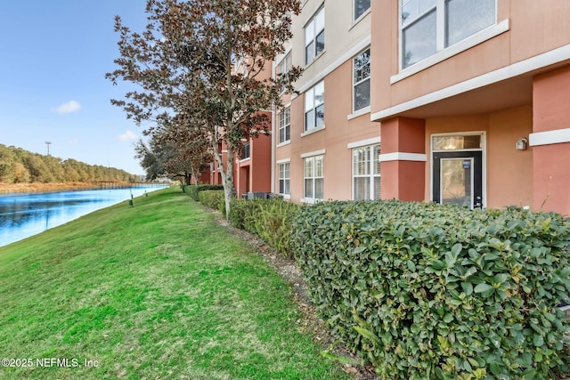 view of yard with a water view