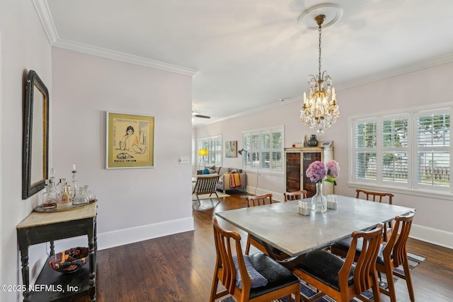 dining area with a notable chandelier, crown molding, and dark hardwood / wood-style floors