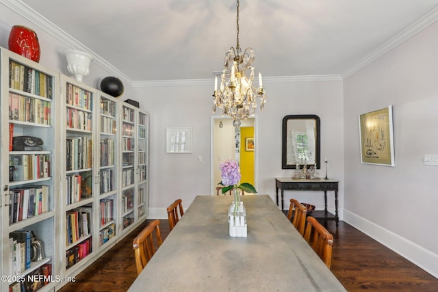 dining area with a chandelier, crown molding, and dark hardwood / wood-style flooring