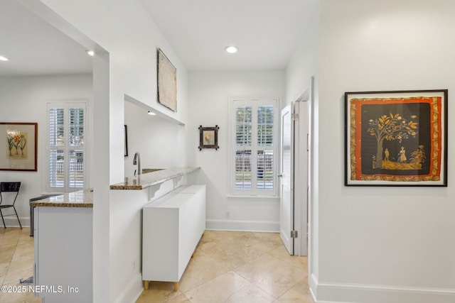 interior space featuring light tile patterned floors