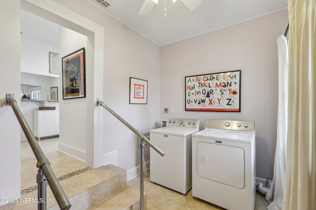 laundry area with independent washer and dryer, ceiling fan, and light tile patterned flooring