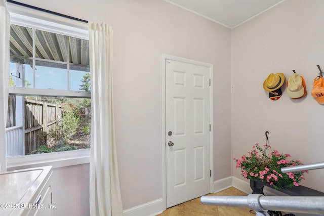 entrance foyer featuring light tile patterned floors