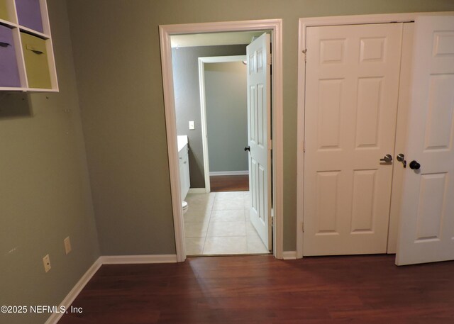 corridor with tile patterned flooring