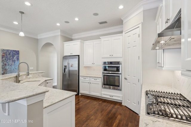 kitchen featuring sink, white cabinetry, hanging light fixtures, stainless steel appliances, and light stone countertops