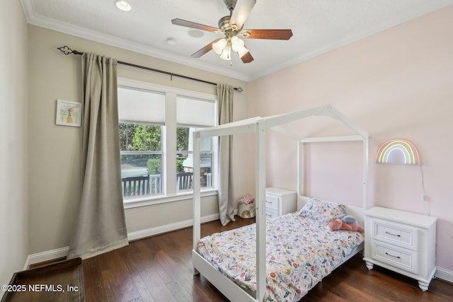 bedroom featuring crown molding, dark hardwood / wood-style floors, and ceiling fan