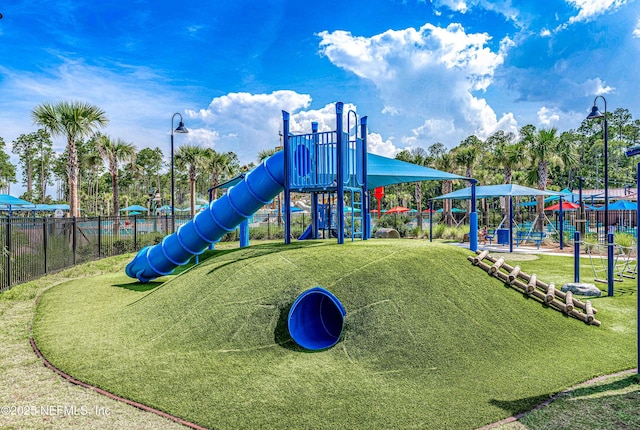 view of play area featuring a lawn