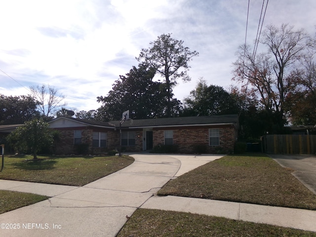 ranch-style house with a front yard