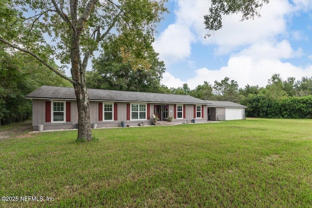 ranch-style house with a front yard and a garage