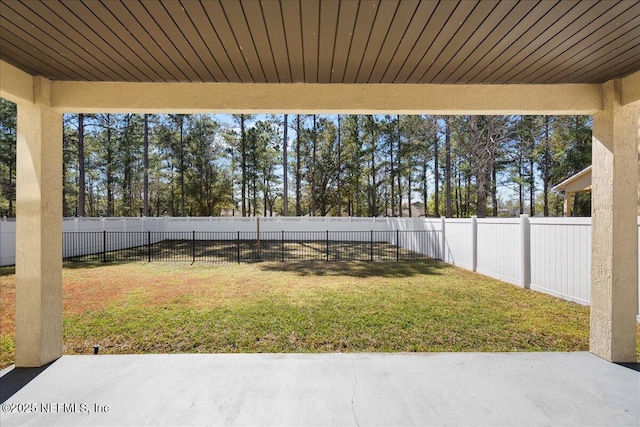 view of yard featuring a patio and a fenced backyard