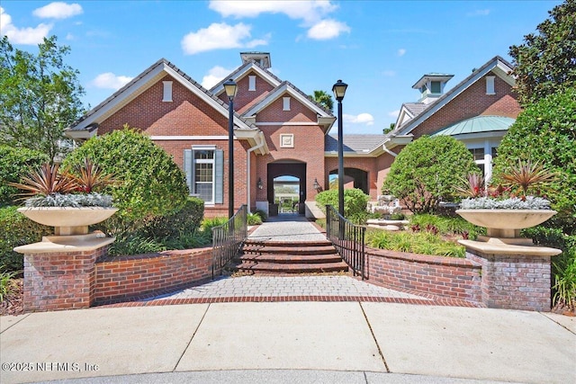 view of front of home featuring brick siding