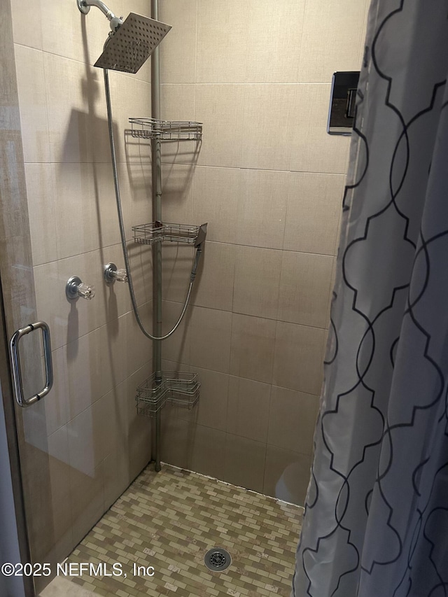 bathroom featuring curtained shower