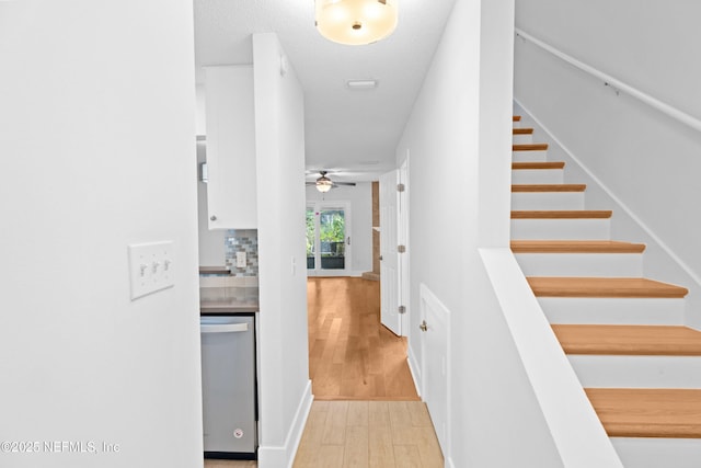 interior space with light wood-style floors and stairs