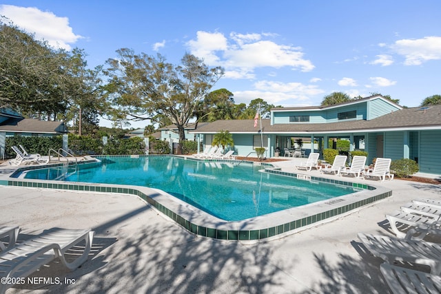 pool with a patio area