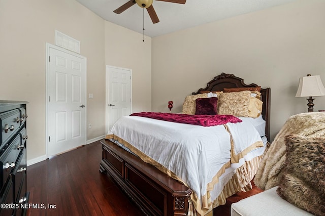 bedroom featuring ceiling fan and dark hardwood / wood-style flooring