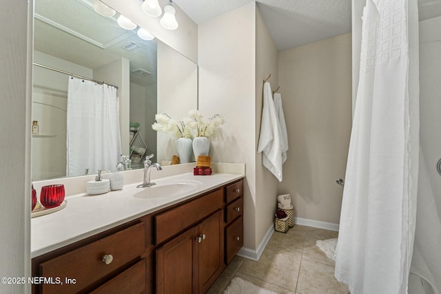 bathroom featuring vanity and tile patterned floors