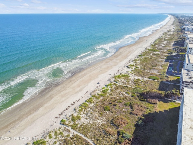 aerial view with a view of the beach and a water view