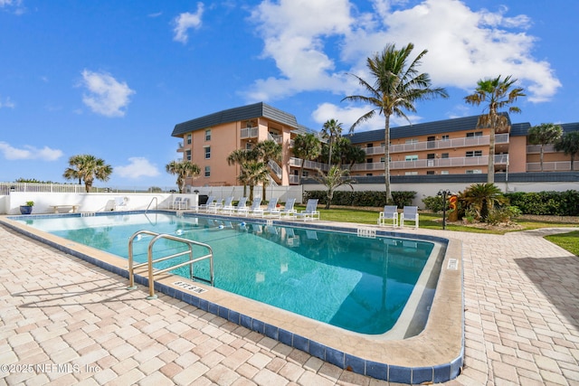 view of swimming pool featuring a patio