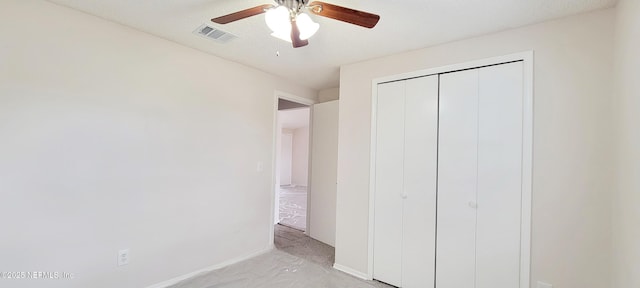 unfurnished bedroom featuring a closet and ceiling fan